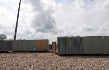 Industrial HVAC systems on rooftop. Equipment retrofits.